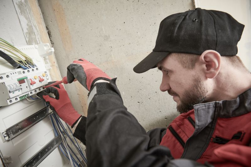 Electrician Installing a Circuit Panel